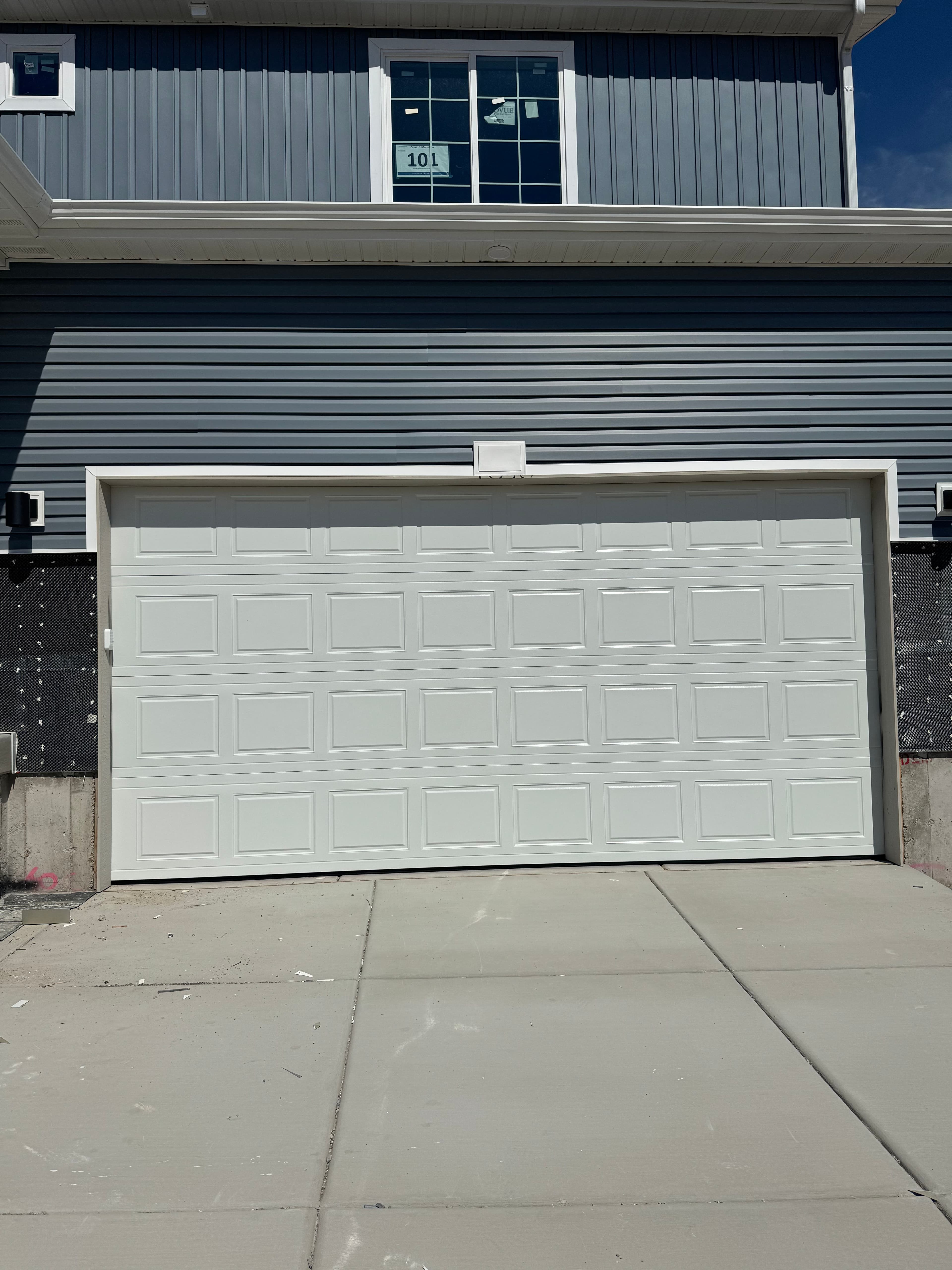 Project New Construction Garage Door Install for Oakwood Homes image