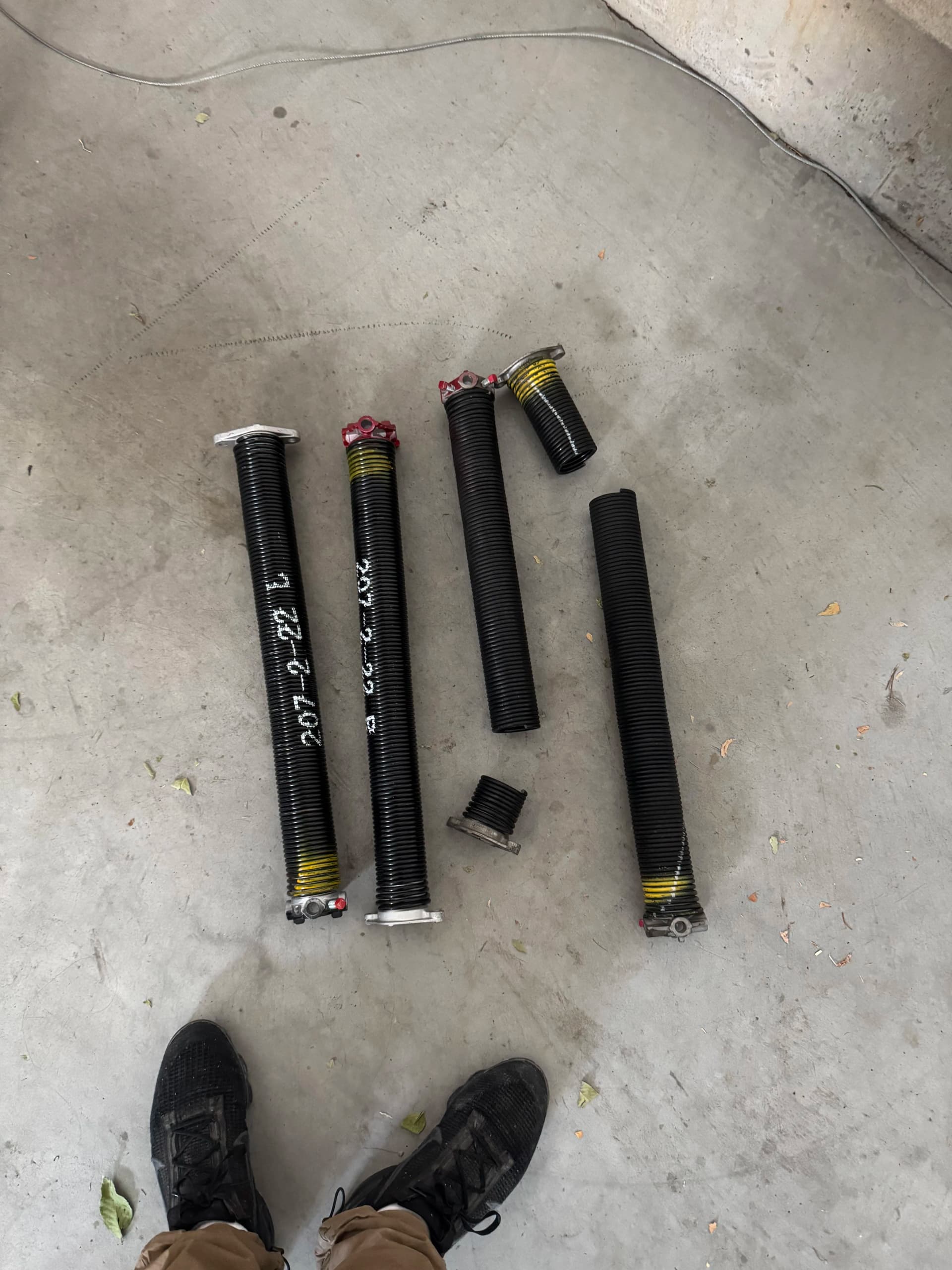 Broken Garage Door Springs Get Replaced the Right Way image