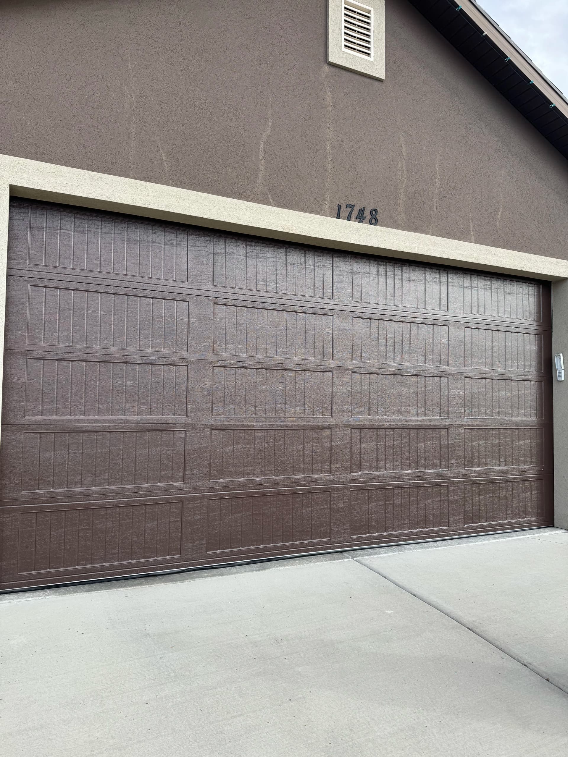 One New Garage Door and the Whole Front of the House Changes image