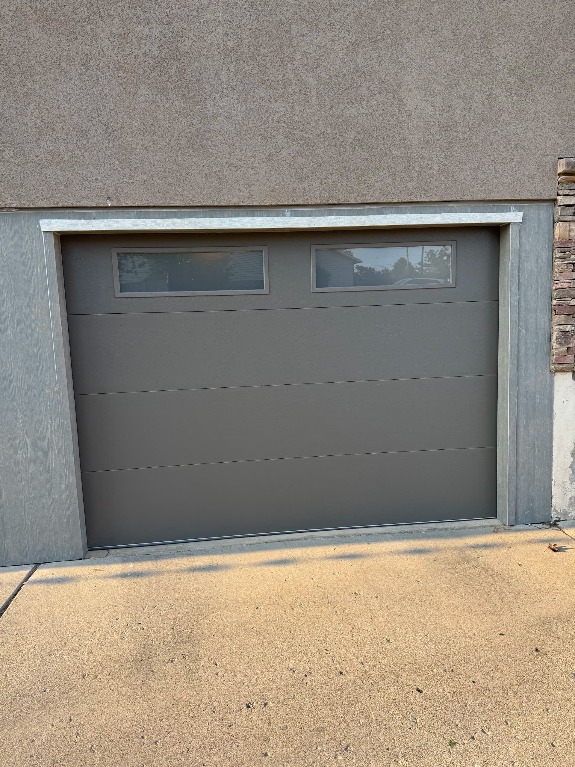 Carport Converted to a Clean, Secure Garage Space image