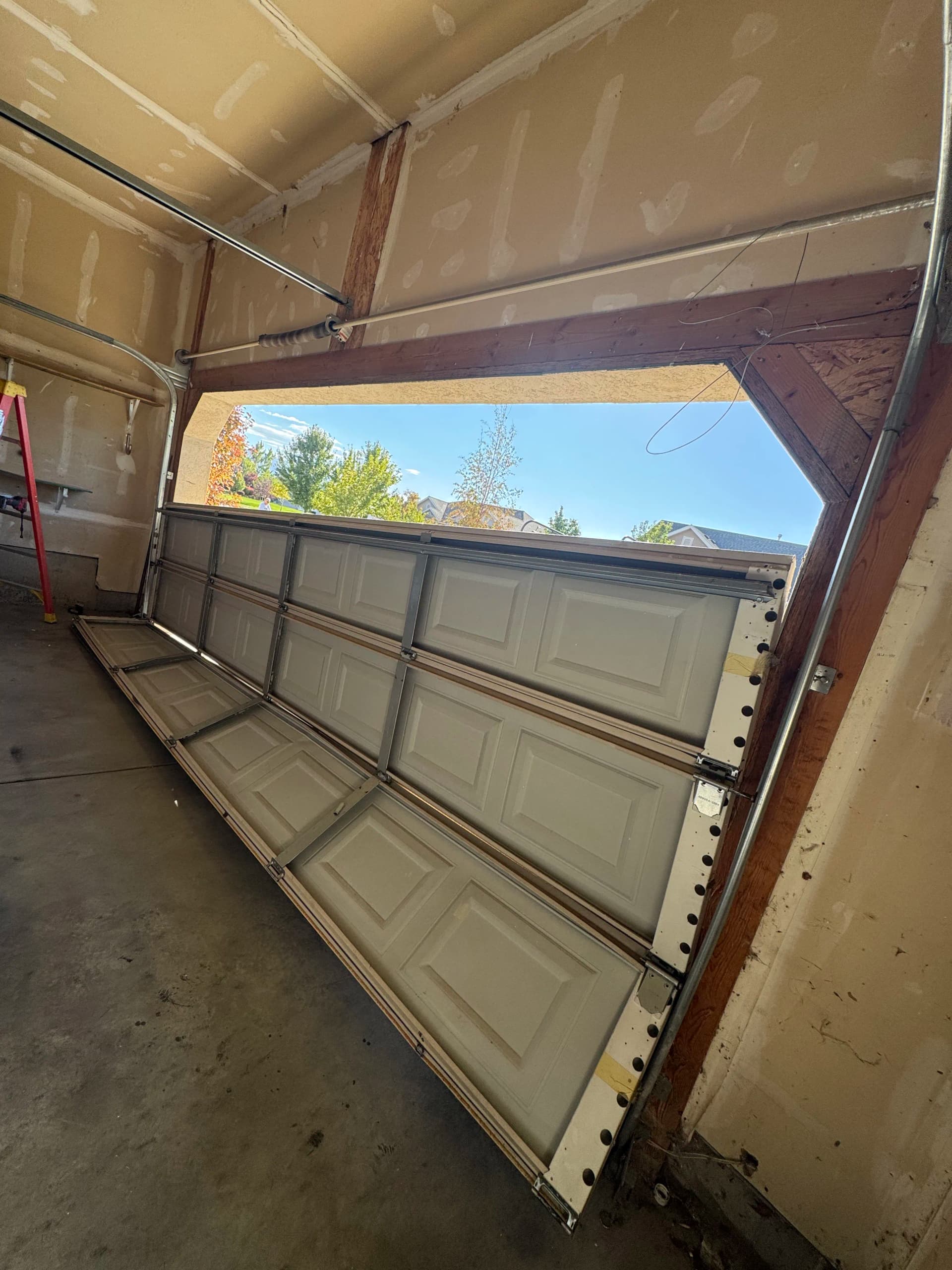 Your Garage Door Could Be One Bad Day Away From a Big Problem image
